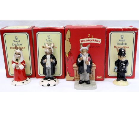 Four Royal Doulton Bunnykins figurines, Judge, Lawyer, Policeman and Barrister, each boxed. No cracks, chips or visible resto