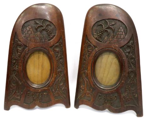 Pair of carved propeller blade photograph frames, dated 1919, H: 31 cm. P&amp;P Group 1 (£14+VAT for the first lot and £1+VAT