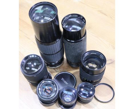 Seven camera lenses including Vivitar. P&amp;P Group 2 (£18+VAT for the first lot and £3+VAT for subsequent lots) 