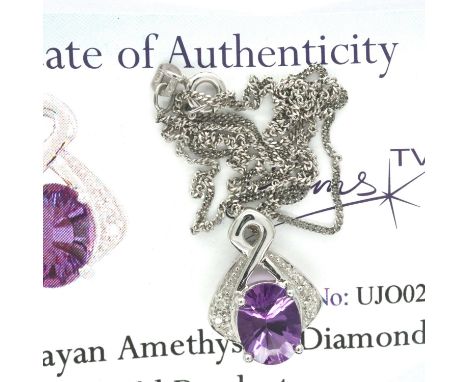 9ct gold Uruguayan amethyst and diamond pendant on a 9ct white gold chain, L: 38 cm, 3.2g. P&amp;P Group 1 (£14+VAT for the f