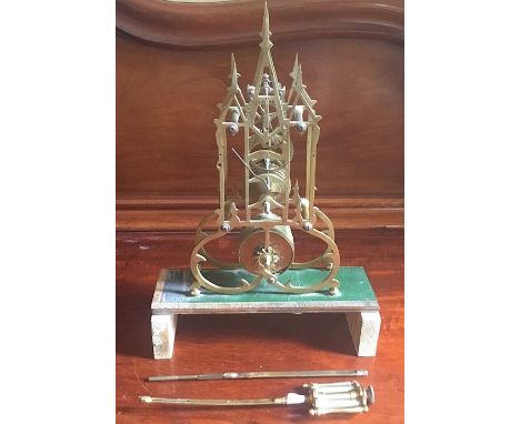 A 19th Century brass triple spire skeleton&nbsp;bracket clock, (mercury pendulum), (later alterations)