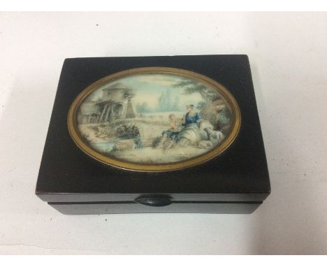 A 19th Century or later porcelain inset patch box, the centre panel depicting a courting couple near sheep,&nbsp;