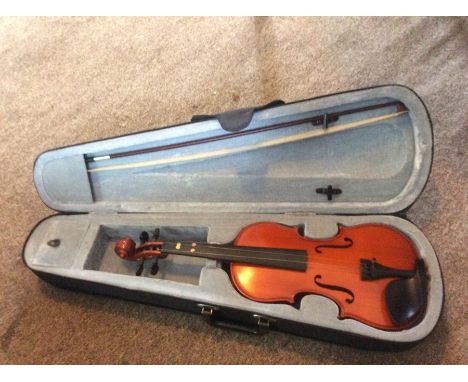 A modern cased violin and bow, complete with carrying case