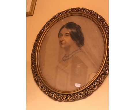An early Victorian portrait, depicting a young lady, indistinctly signed, dated 1852, fitted in a gilt frame, 75cm x 66cm