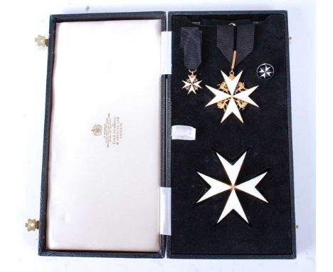 The Most Venerable Order of St John set of insignia to include neck badge the Maltese cross in gilt and white enamel with lio