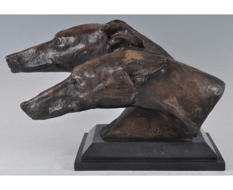 After M. Bertin, (French 20th century), At the finish line, bronzed resin bust with incised signature, on a stepped plinth ba