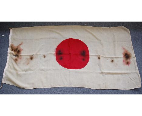 A WW II period Japanese flag of cotton construction with central red "meatball" disc, 89 x 175cm, together with a Union Flag,