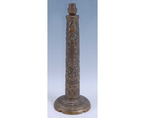 A WW II trench art type lamp base, of brass construction, the slightly tapering column embossed with the Polish eagle, Poland
