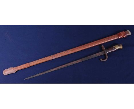 A French M1874 Gras bayonet, having a 52cm cruciform blade with hooked quillon and two piece grip, 65cm, together with a scab