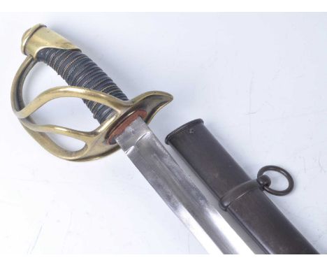 A Prussian 1860 pattern Cavalry sword, having an 87cm curved steel blade with single fuller, the forte with kings head mark f