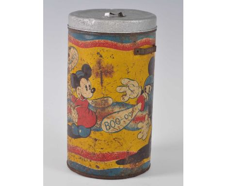 A WW II child's respirator housed in a lithograph printed tin depicting Mickey Mouse wearing a respirator and trying to scare