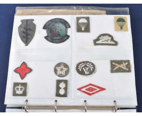A collection of cloth insignia to include formations signs for the 78th Infantry Division, 11th Armoured Division and 6th Arm
