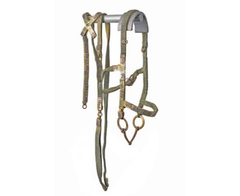 dating: 18th Century provenance: China, Iron snaffle bit with articulated mouthpiece. Light-blue, fabric bridle with white me