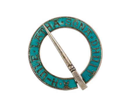 ENAMELLED KILT PIN, DESIGNED BY ALEXANDER RITCHIE, BY WH DARBY in silver with turquoise enamel reading 'A h-uile latha sona d