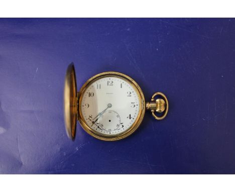 A vintage gold plated Dennison pocket watch (needs attn) 