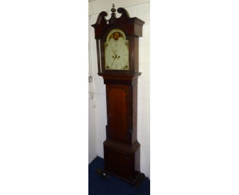 A George III oak and mahogany longcase clock circa late 18th century, with broken swan pediment above painted celestial dial 