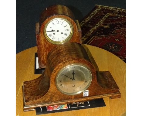 An Edwardian oak cased mantel clock, the white enamel dial with Roman numerals and twin train movement, named London & Paris 