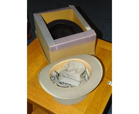 A vintage grey felt wedding top hat, bearing label to the interior for Christy's London, 6 7/8 stamped to interior, together 