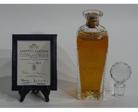 A boxed specially blended 25 years old scotch whisky, commissioned by Glamis Castle to commemorate the 90th birthday of HM Qu