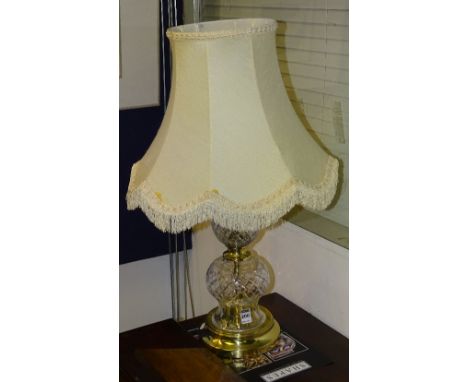 An Edinburgh Crystal and gilt metal double gourd style table lamp with shade, fitted for electricity, lamp 35cm high