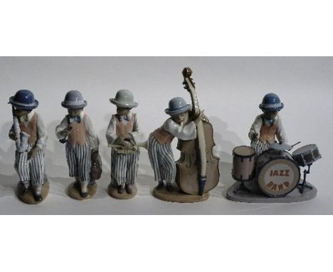 A Lladro five figure jazz band, featuring drummer, clarinet, saxophone, double base and trumpet, each with Lladro stamp to ba