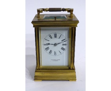A late 19th century large brass repeater carriage clock retailed by Edward & Sons Glasgow, the twin train movement striking o