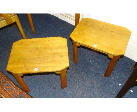 A pair of walnut lamp tables possibly by Whytock and Reid, with octagonal top raised on shaped supports, 42cm high x 51cm wid