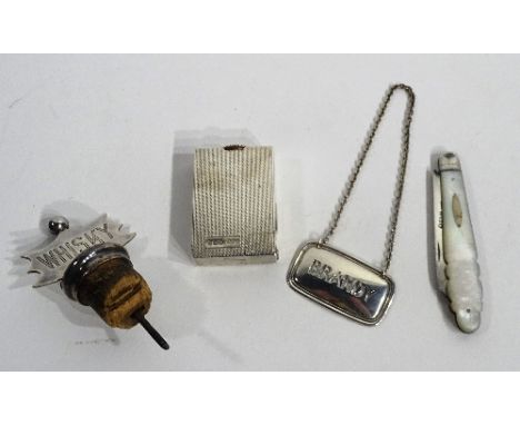 A silver cigarette lighter, hallmarks for Birmingham 1922 B & C, of engine turned design, 4.5 x 3cm, together with a Tiffany 