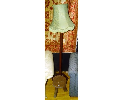 A rustic Wanderwood stool, 33cm high x 32cm wide, together with an Art Deco painted floor lamp with shade, fitted for electri