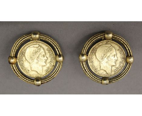 A pair of vintage earrings made out of French Francs. 3.5 cm diameter.