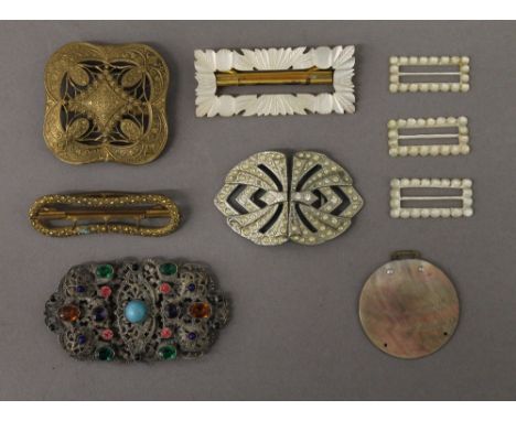 A collection of various vintage buckles 