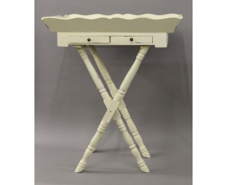 A painted butlers tray on stand and a commode chair. The former 67.5 cm wide.