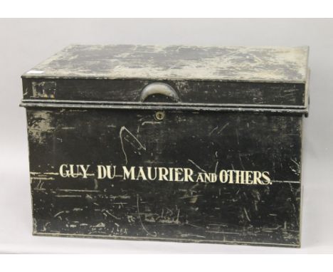 A tin deed trunk, inscribed Guy Du Maurier and others. 67 cm wide.