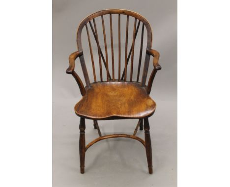 A 19th century stick back Windsor chair. 53.5 cm wide.