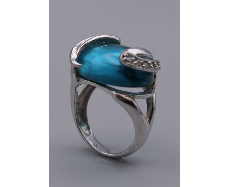 A silver blue stone ring. Ring Size L. 