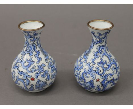 A pair of Chinese enamel vases. 10 cm high.