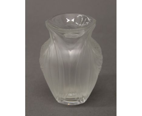 A Lalique (R) glass vase. 12 cm high.
