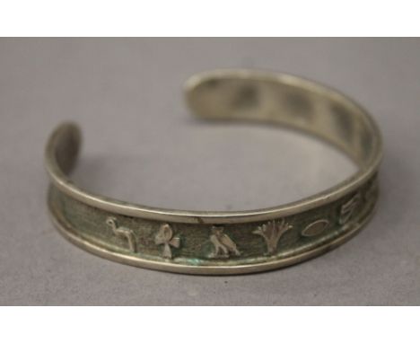 An Egyptian unmarked silver bangle. 6.5 cm wide. 22 grammes.