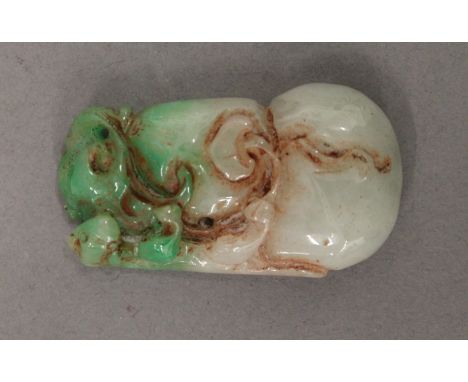 A jade pendant. 5.5 cm high.