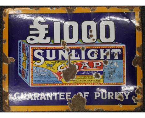 An original Sunlight Soap pictorial enamel advertising sign. 91.5 x 68.5 cm.