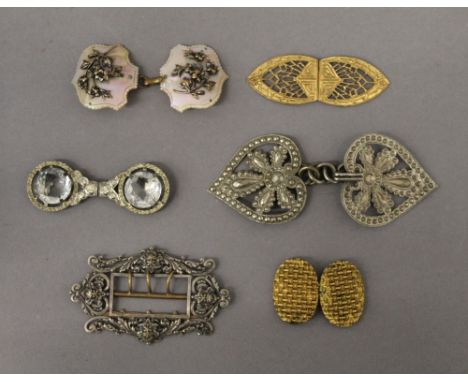 A collection of various vintage buckles 