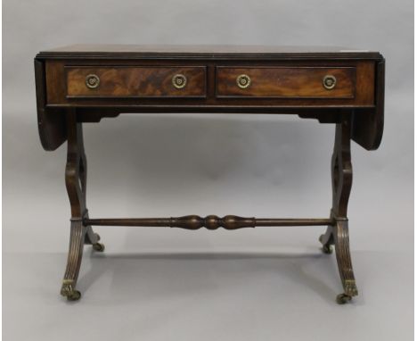 A mahogany sofa table. 96 cm wide flaps down.