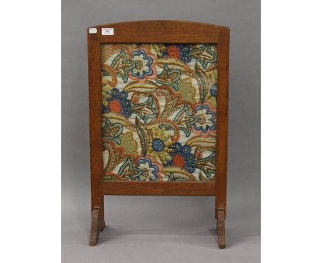A modern mirror and a tapestry inset firescreen. The latter 73 cm high.