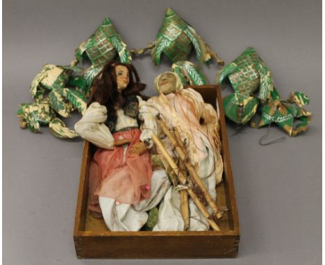 Two vintage Indian street market puppets. The largest 41 cm high.
