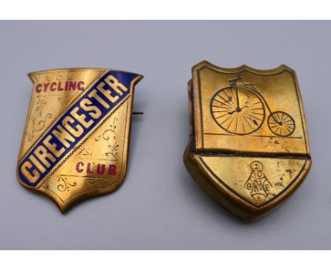 A brass and enamel decorated Cirencester Cycling Club badge and a brass clip decorated with a penny farthing. The former 3.5 