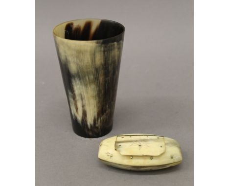 A 19th century horn beaker with glass base and a 19th century horn snuff box with engraving, probably Scandinavian. The forme