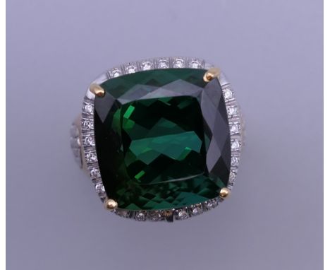 A 14 ct gold tourmaline and diamond ring. Ring size K. 10 grammes total weight.