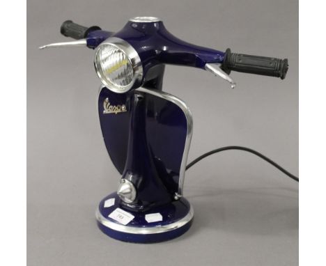 A Vespa form table lamp. 32.5 cm high.