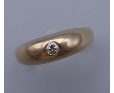 A 9 ct gold gentleman's diamond set ring. Ring Size U. 6 grammes total weight.