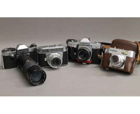 A collection of vintage cameras, including Voigtlander, etc. 